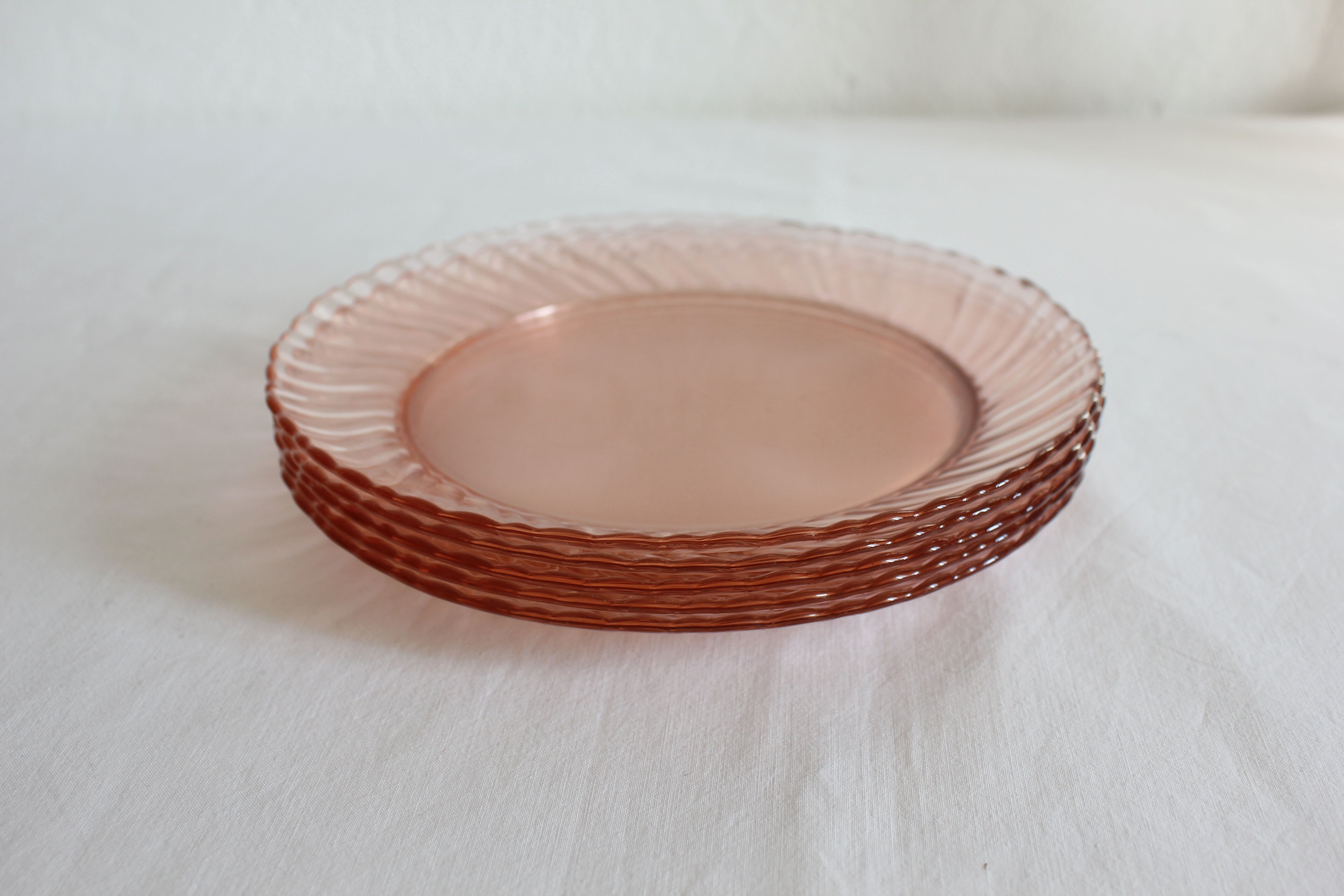 5 vintage Rosaline dessert plates in pink glass