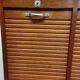 Double curtain cabinet