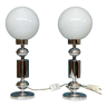 Pair of stainless steel table lamp and white opaline globe