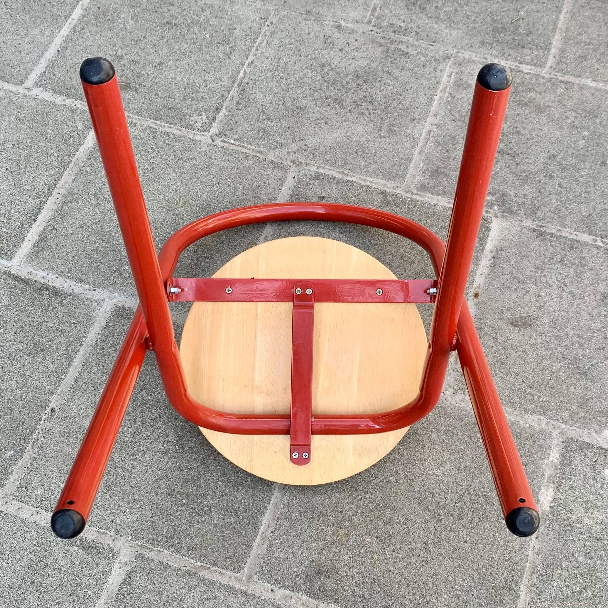 Vintage folding chair in red painted metal and wood