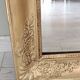 Wood and gilded stucco mirror, 19th century, 115 x 61.5 cm.
