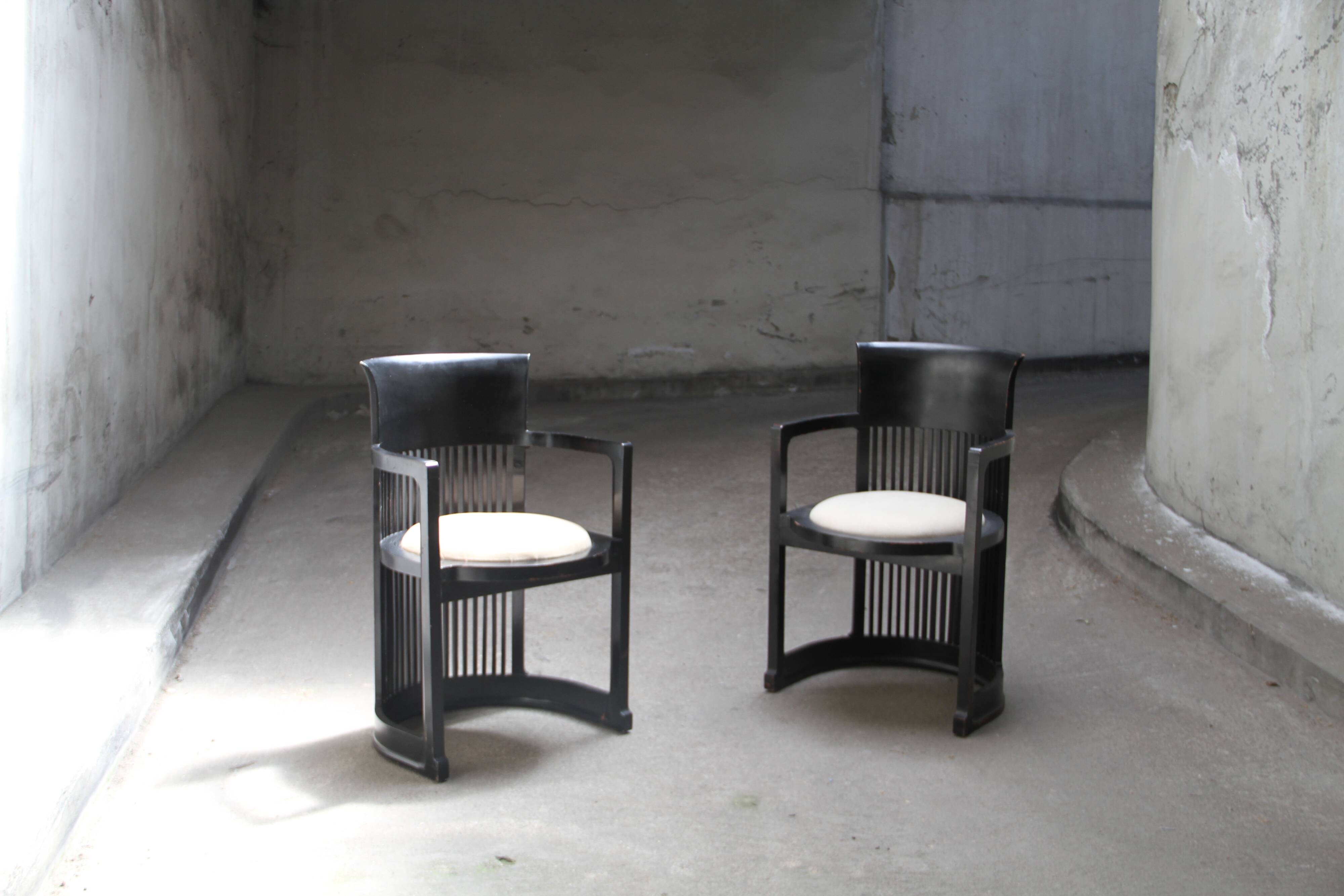 Pair of in the style of Franck LLoyd Right armchairs