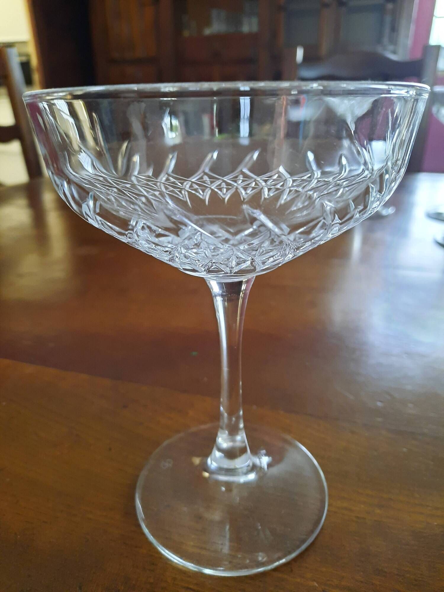 Set of 12 cut glass champagne glasses monogrammed EB.