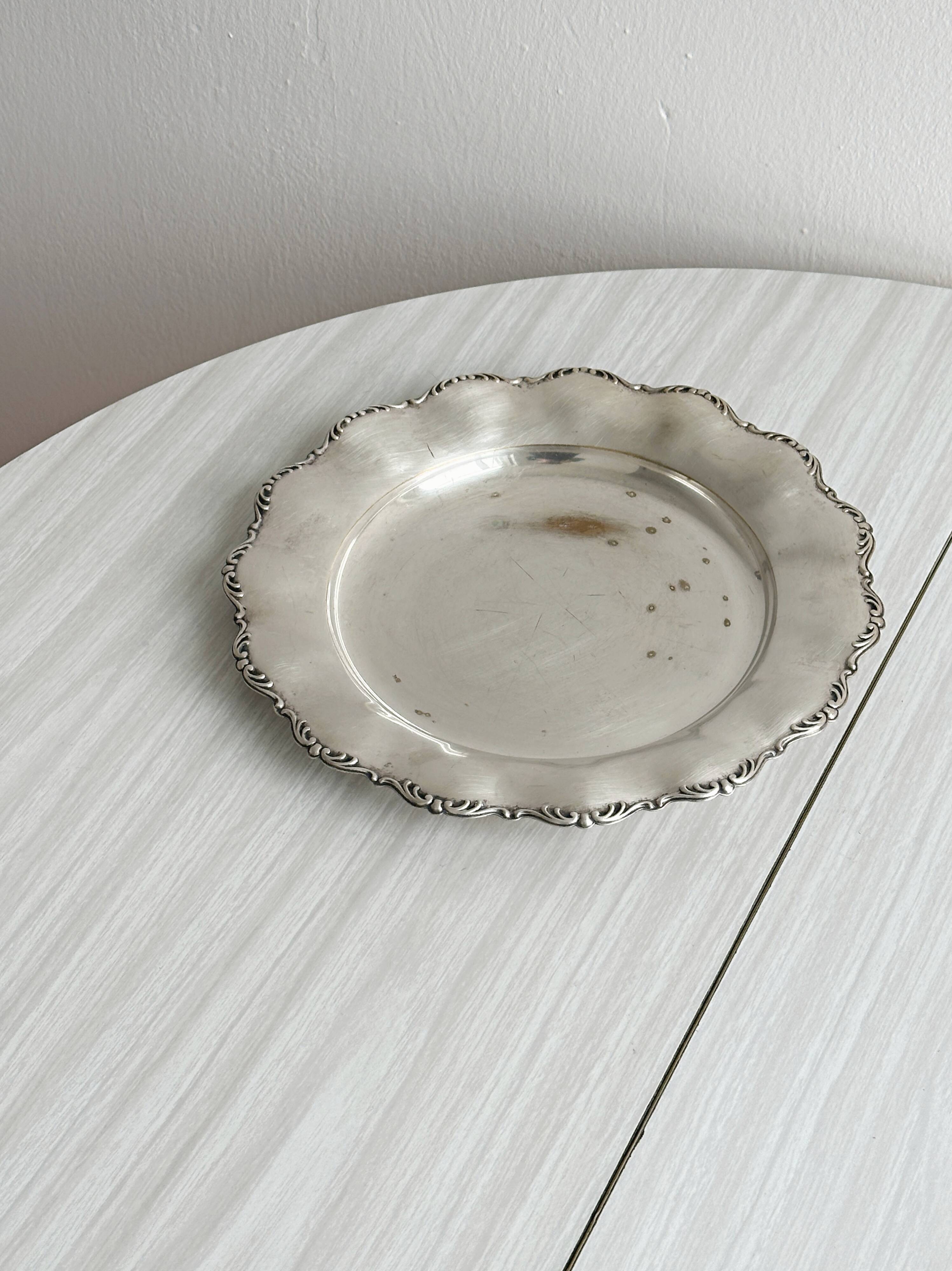 Shiny antique metal plate