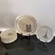 Series of 12 dessert plates and its cake tray Gien Paris Monuments