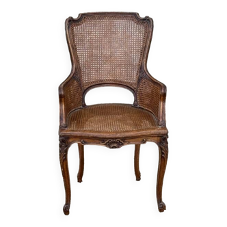 Cane armchair