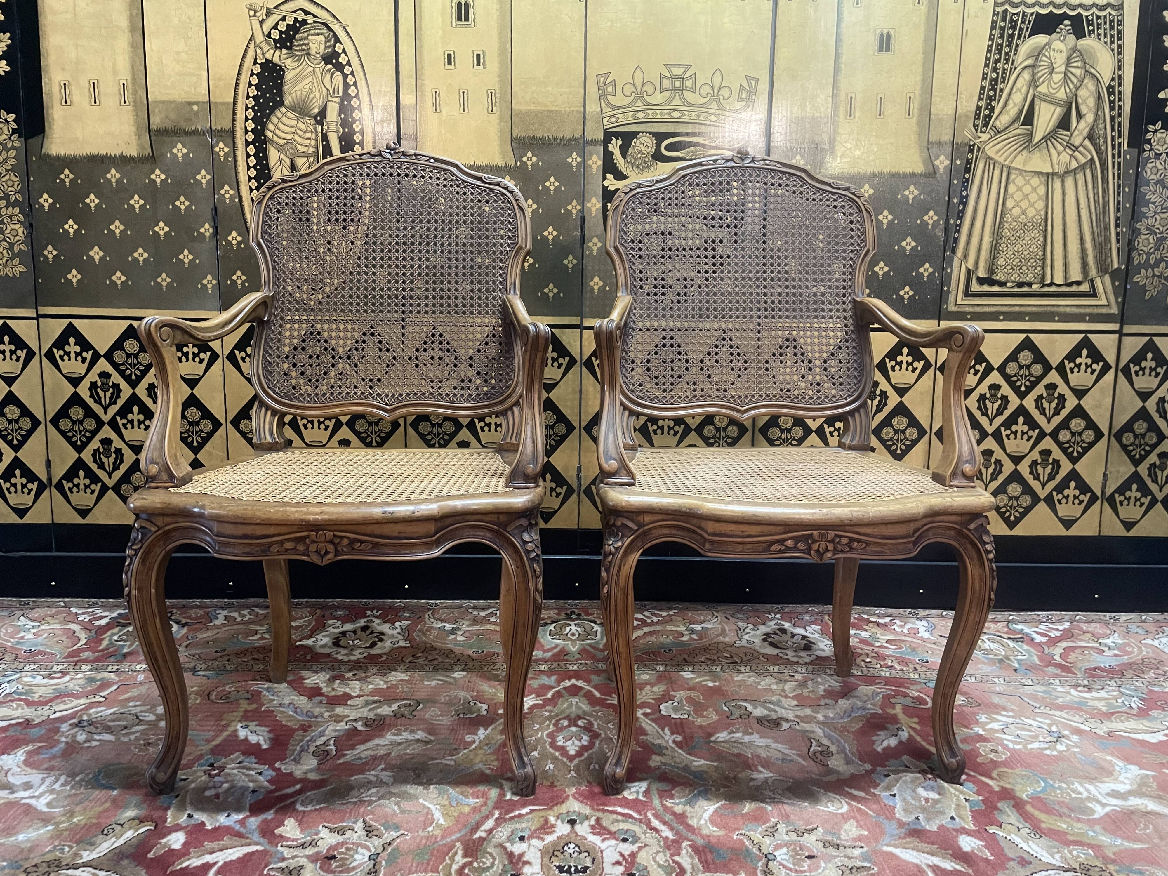 Pair of Louis XV style armchairs in canework