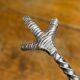 Sugar tongs or ice tongs in silver-plated metal.