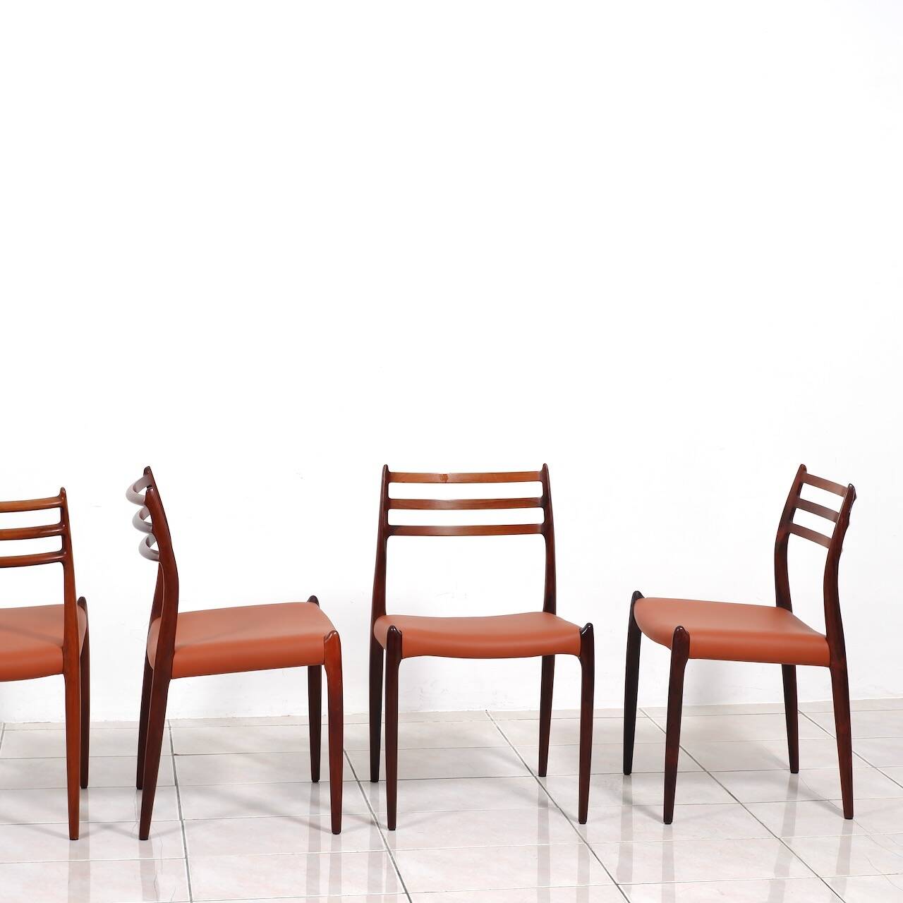 Set of 6 Niels Moller „Model 78“ rosewood dining chairs with cognac leather