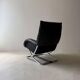 Swiss lounge chair with ottoman by Robert Haussmann from the 1980s.