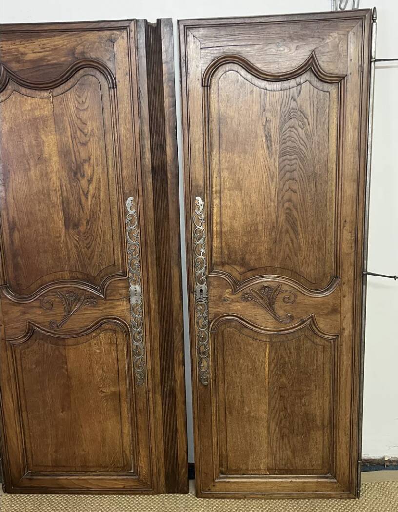 Pair of antique wardrobe doors and crosspiece