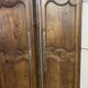 Pair of antique wardrobe doors and crosspiece