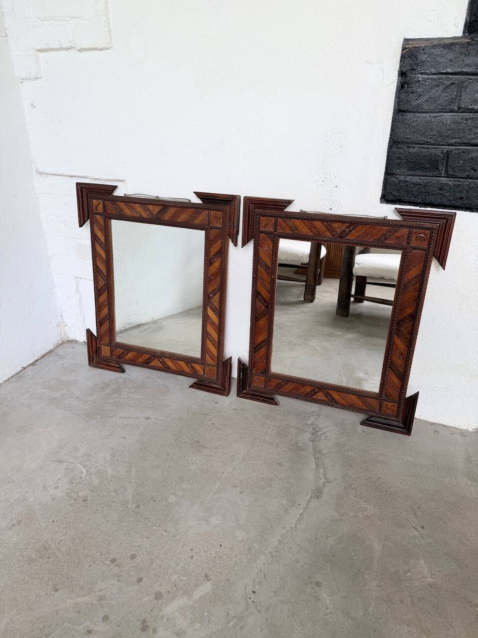 Pair of wooden mirrors in tramp art style