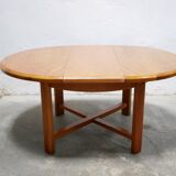 Vintage extendable round wooden dining table