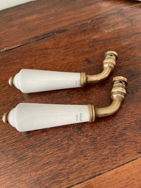 pair of Limoges porcelain handle levers UCDA and l