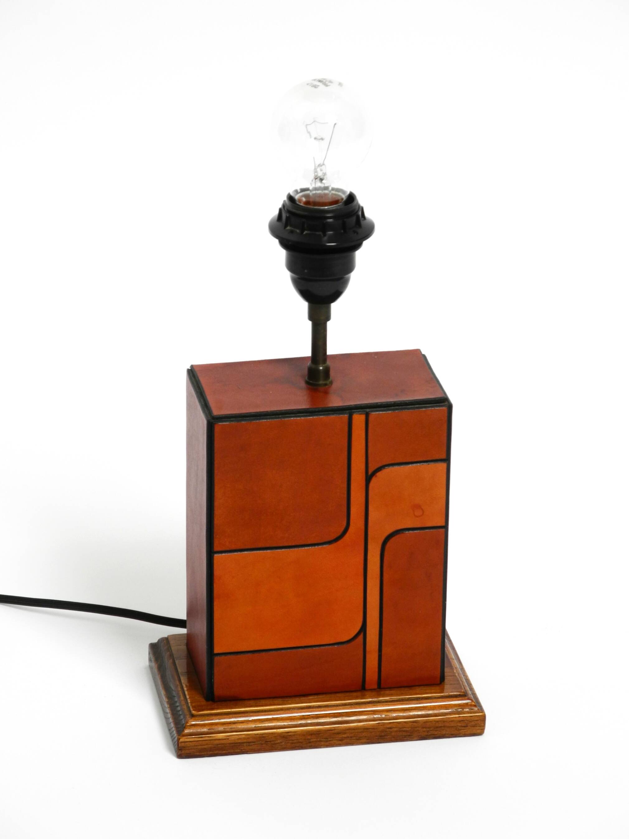Italian 60s table lamp made of wood and leather with paper straw lampshade