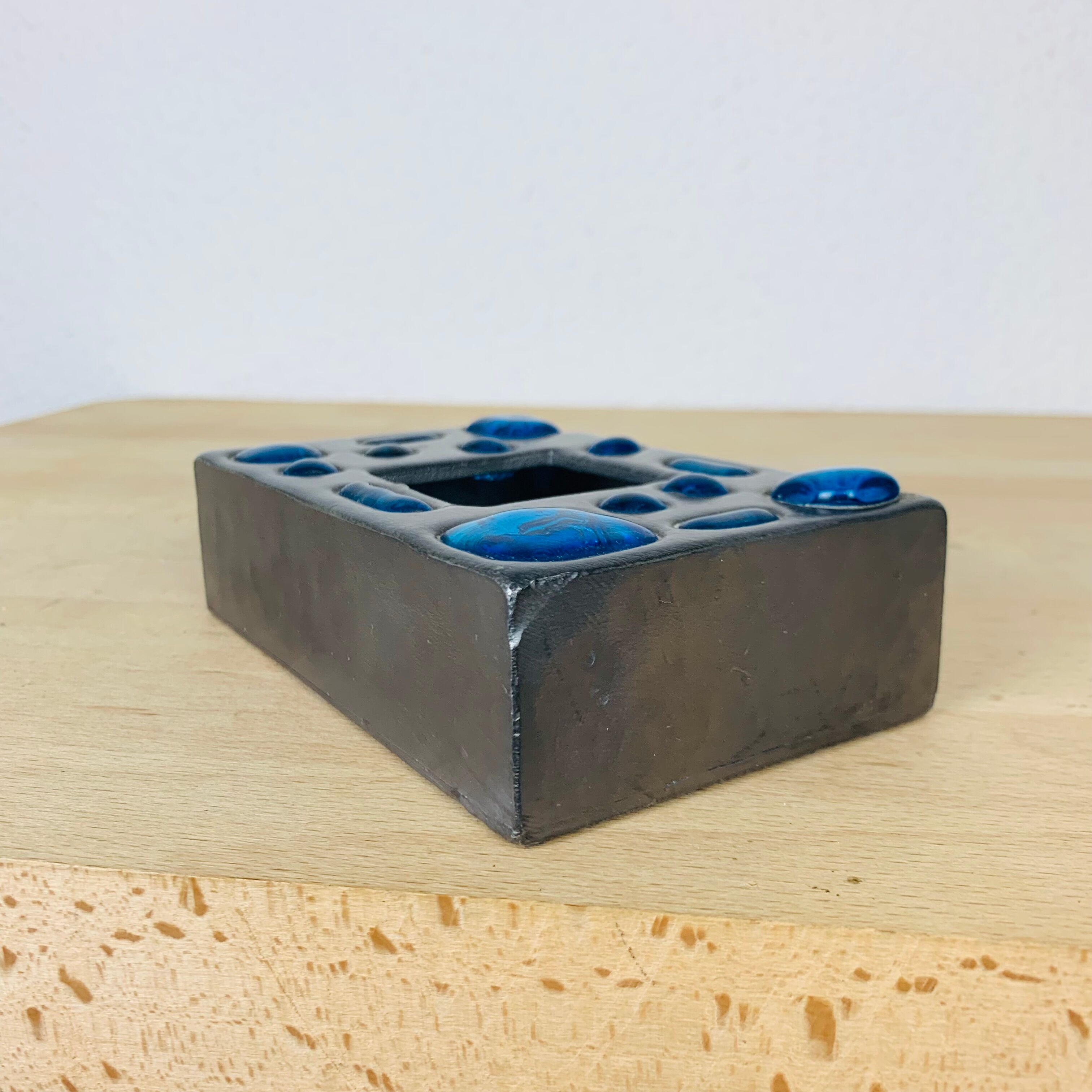 Decorative metal box and blue glass