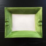 Empty green pocket and ivory