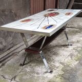 Coffee table with ceramic top.