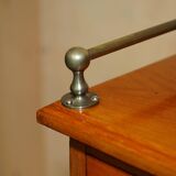 Victorian high chest of drawers in walnut with a bronze gallery.
