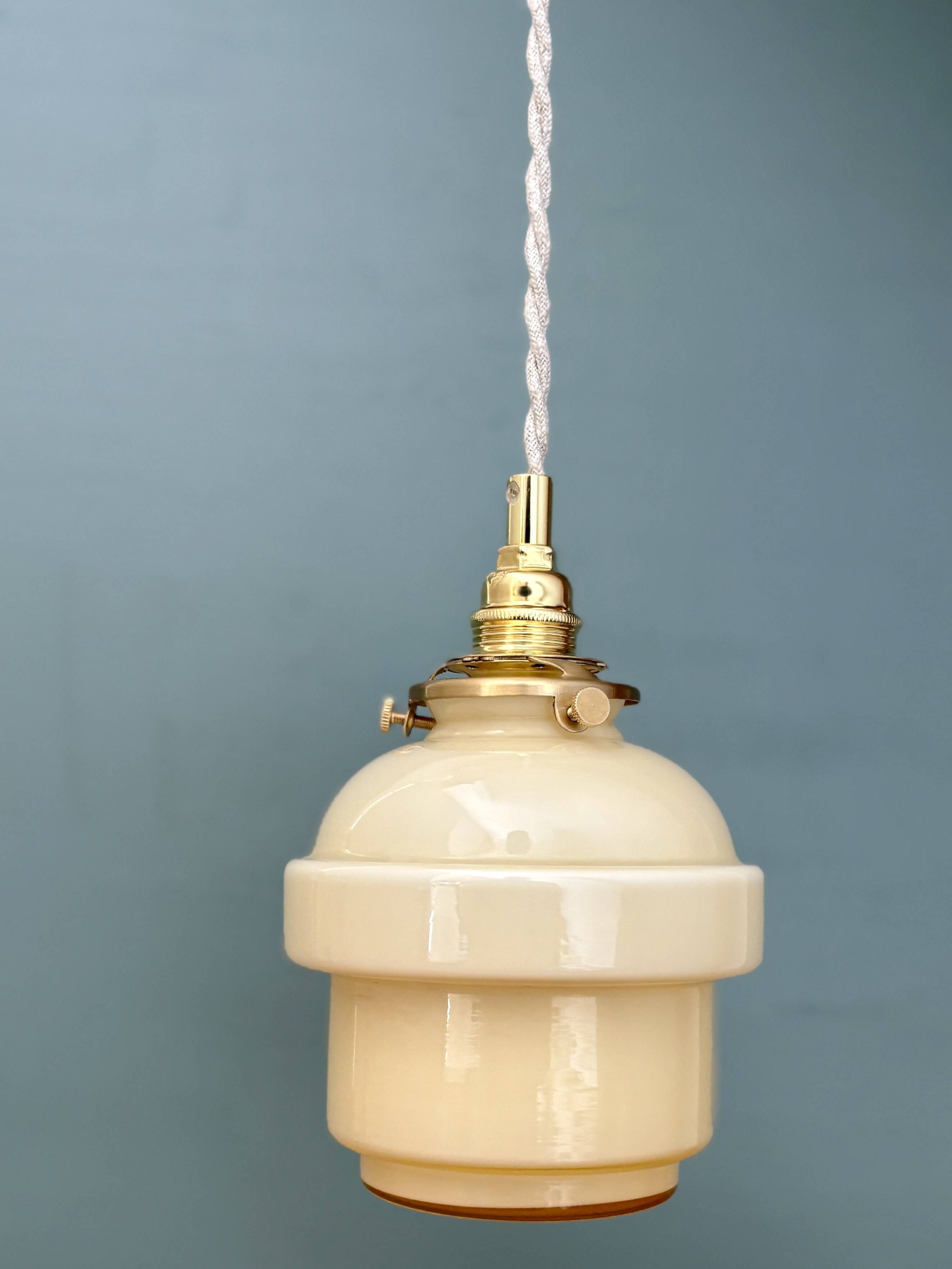 Vintage globe pendant light in pale yellow opaline glass