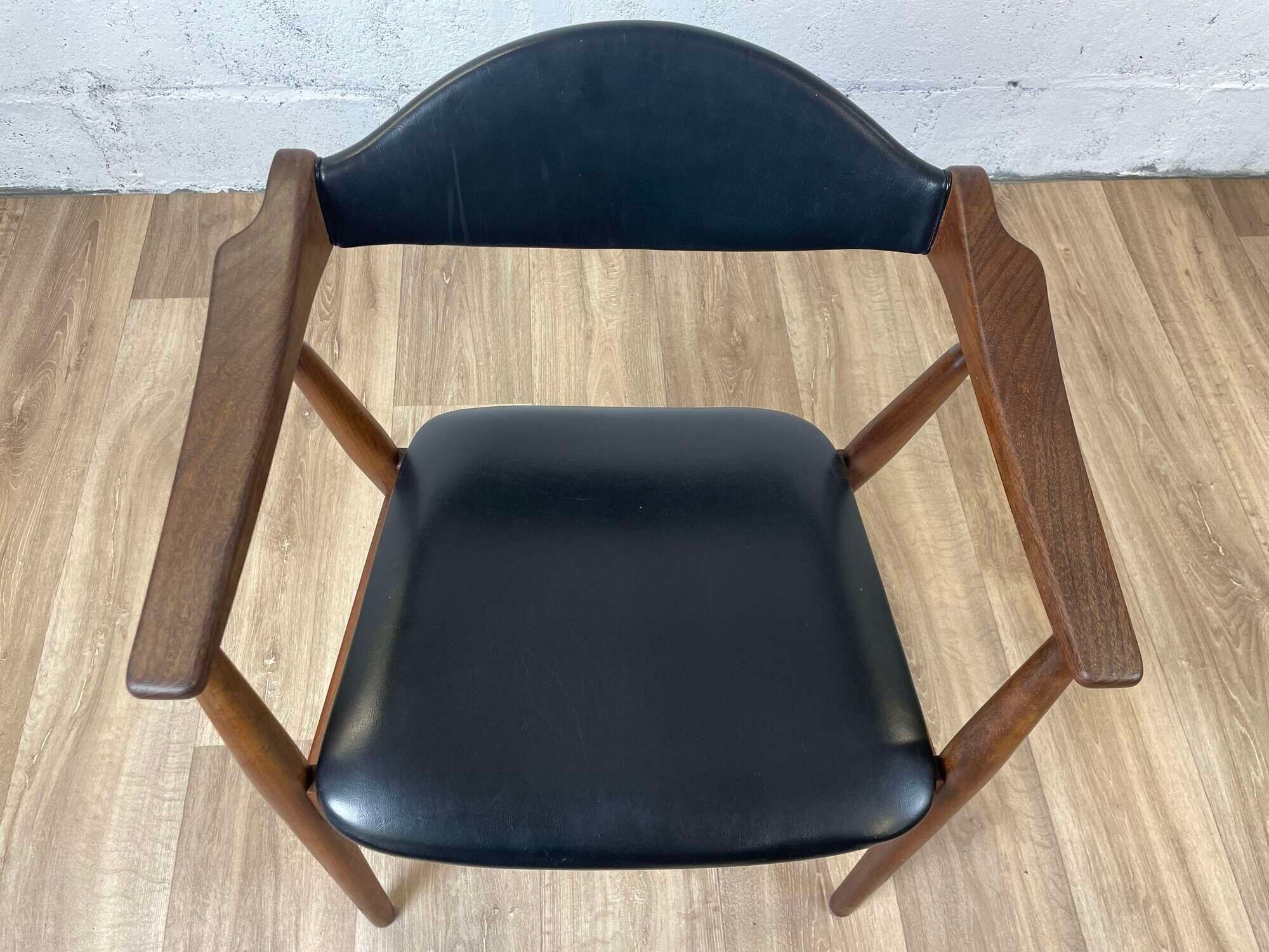 Vintage Scandinavian armchair in teak and black skai, 60s