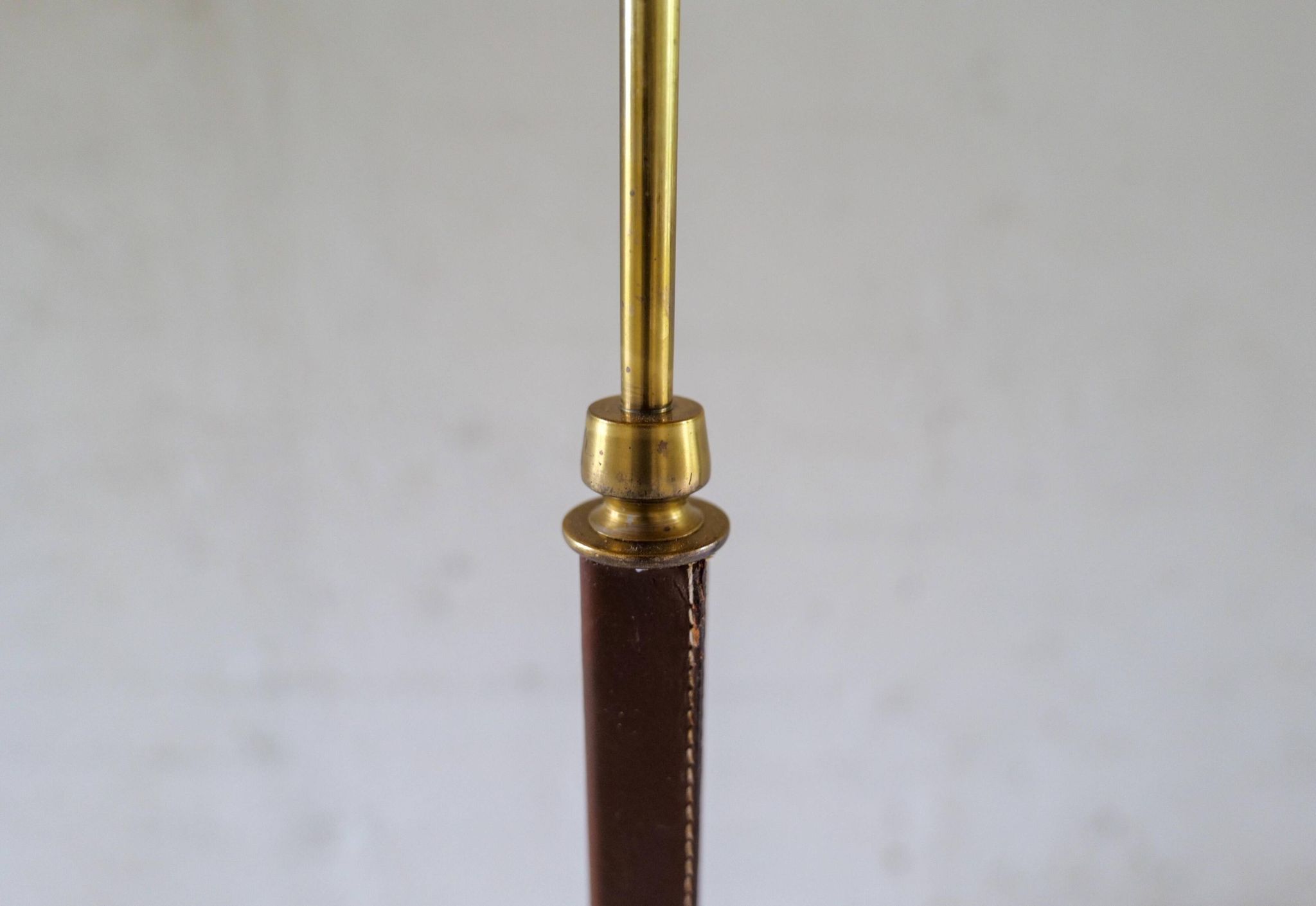Mid-century brown leather and patinated brass floor lamp by Falkenbergs Belysning, Sweden, 1960s.