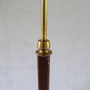 Mid-century brown leather and patinated brass floor lamp by Falkenbergs Belysning, Sweden, 1960s.