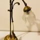 Brass table lamp with a glass shade
