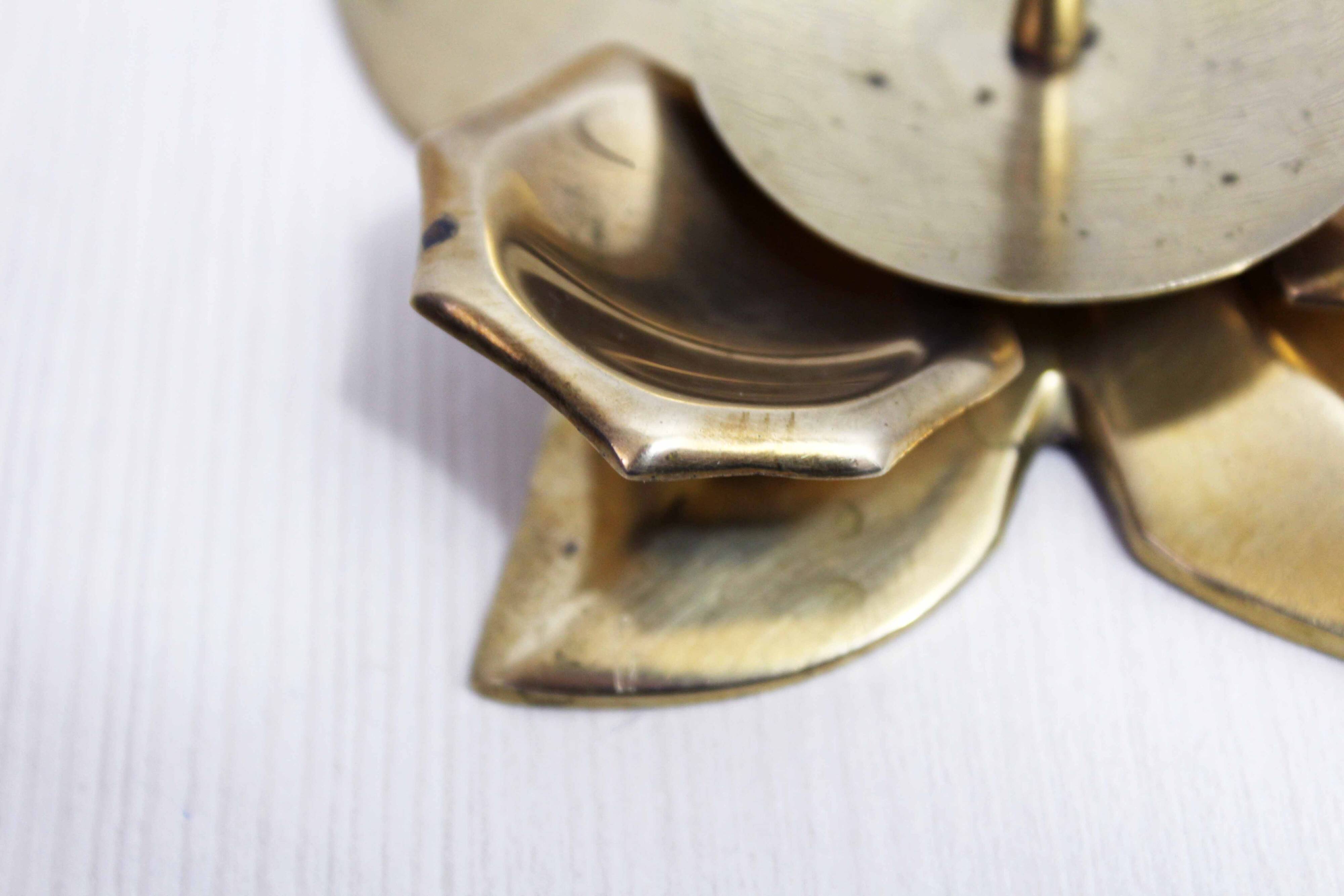 Brass flower candle holder