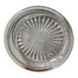 Vintage pressed molded glass plate under bottle