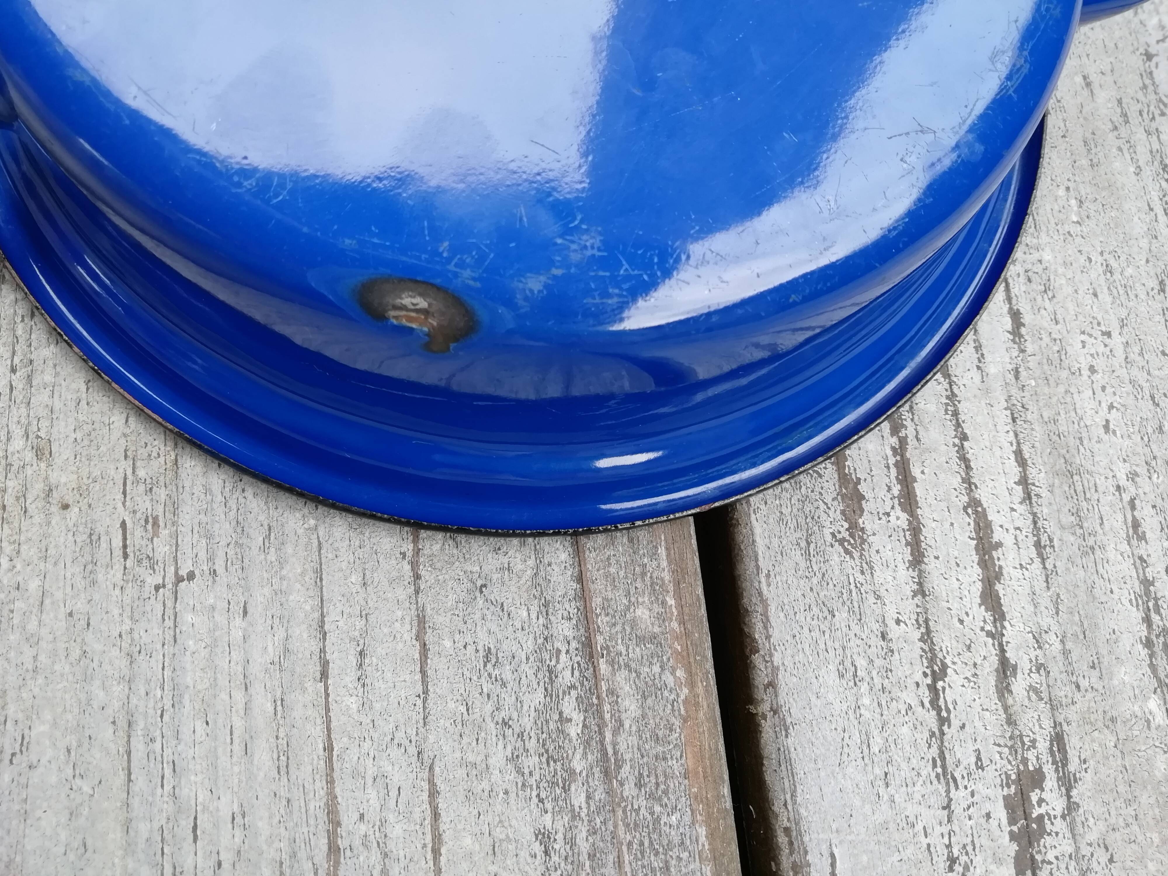 Enamelled sheet metal plate