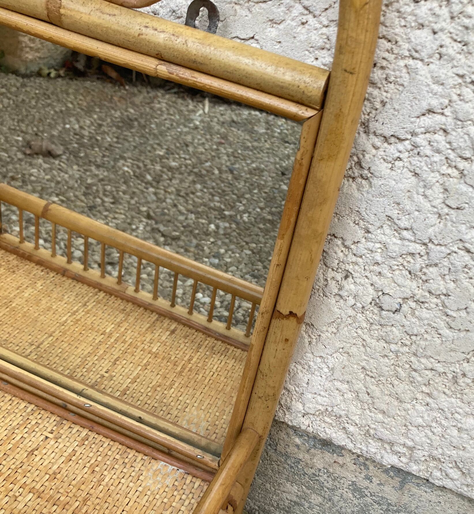 Vintage rattan wall shelf with mirror