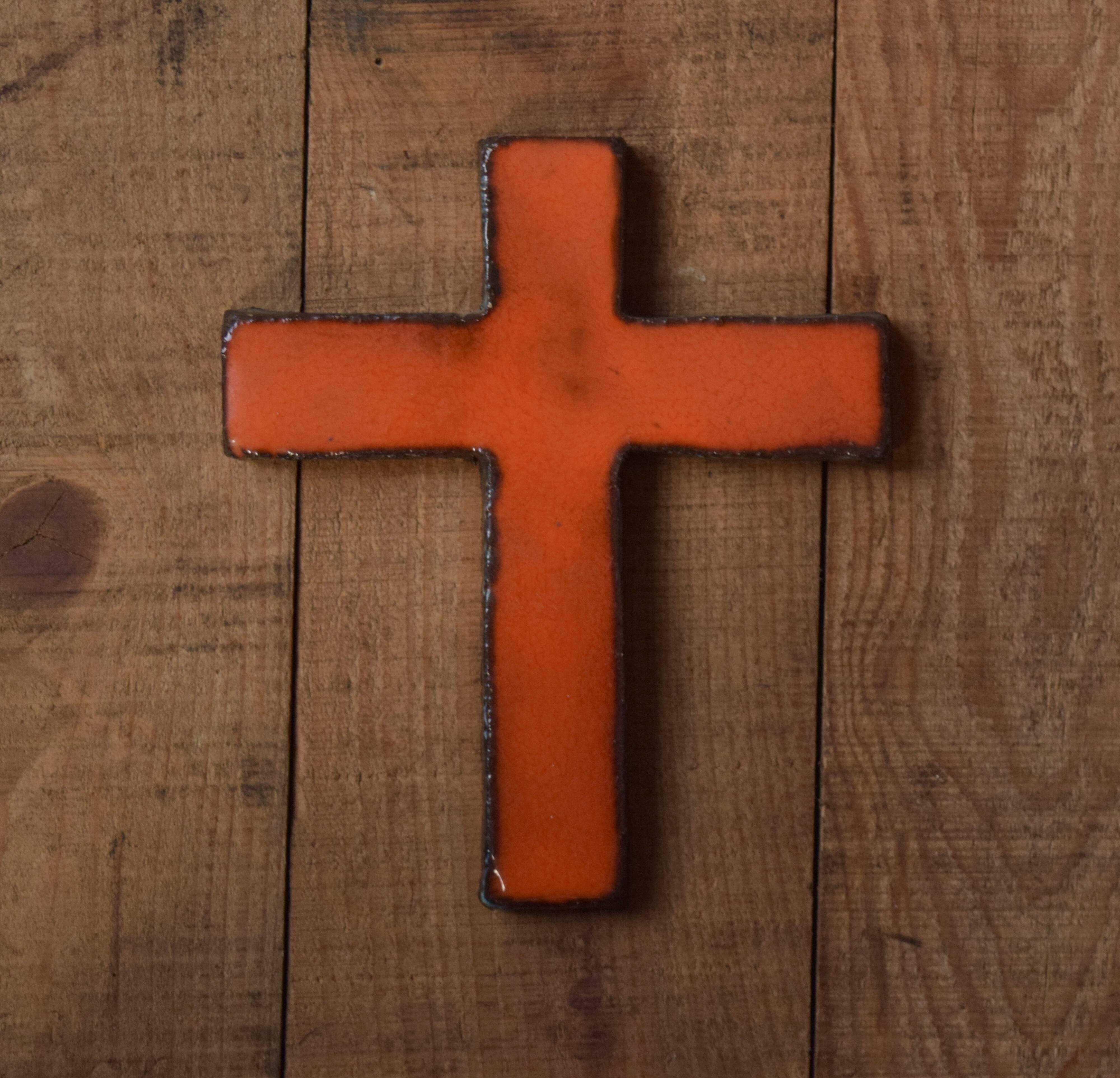 Orange glazed ceramic cross