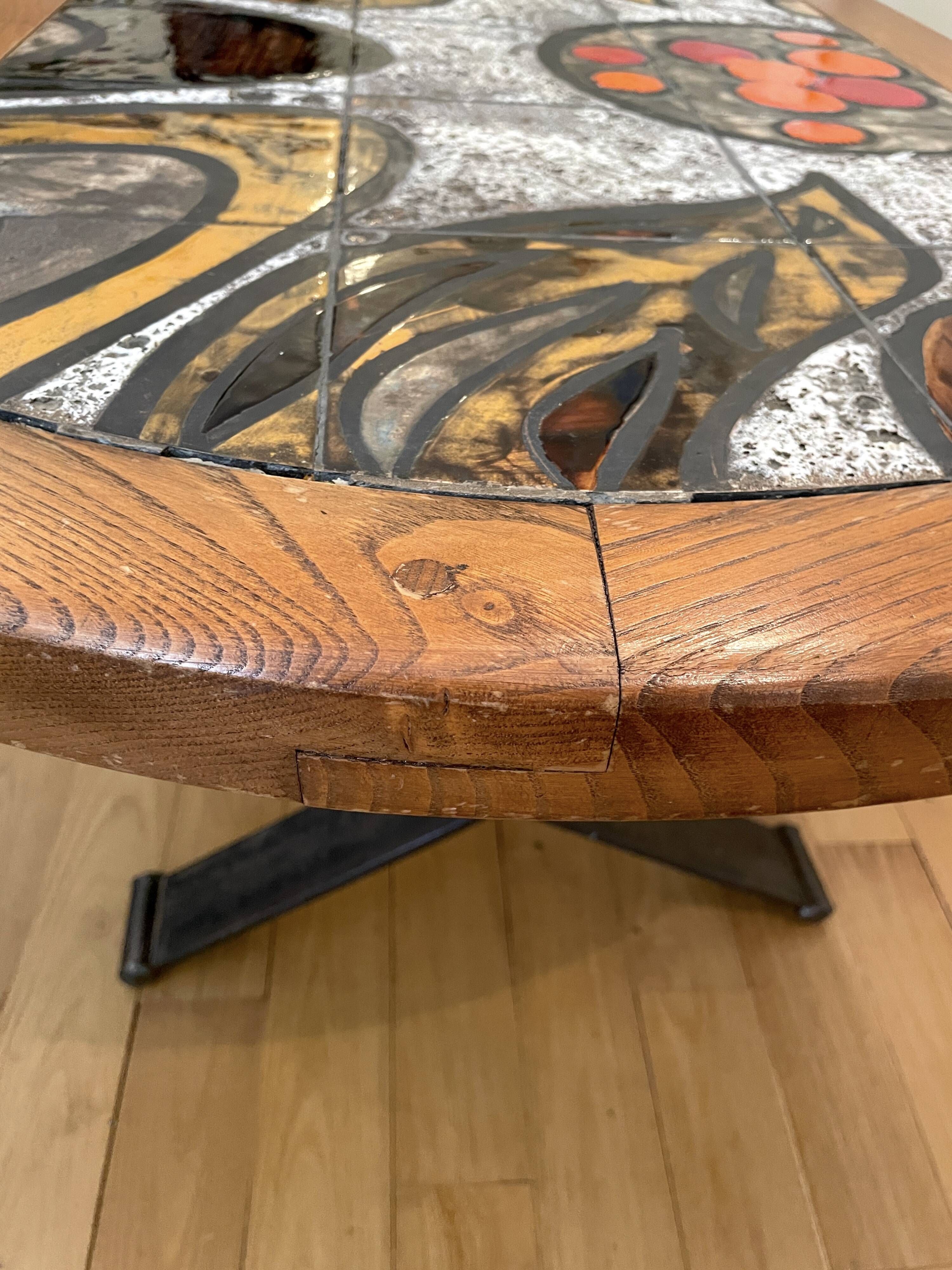 Ceramic coffee table with metal base by G. Reynaud Vallauris