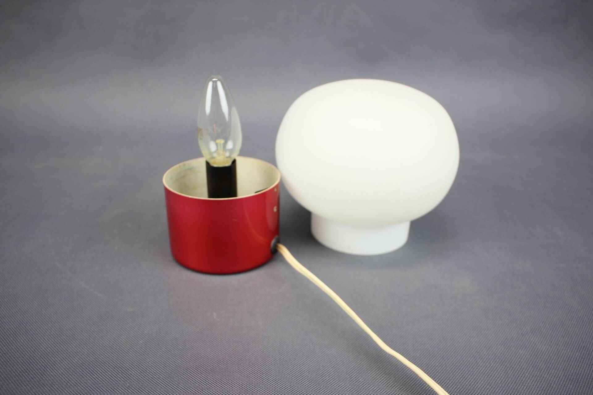 Burgundy Red opaline glass table lamp from the 1970s space age.