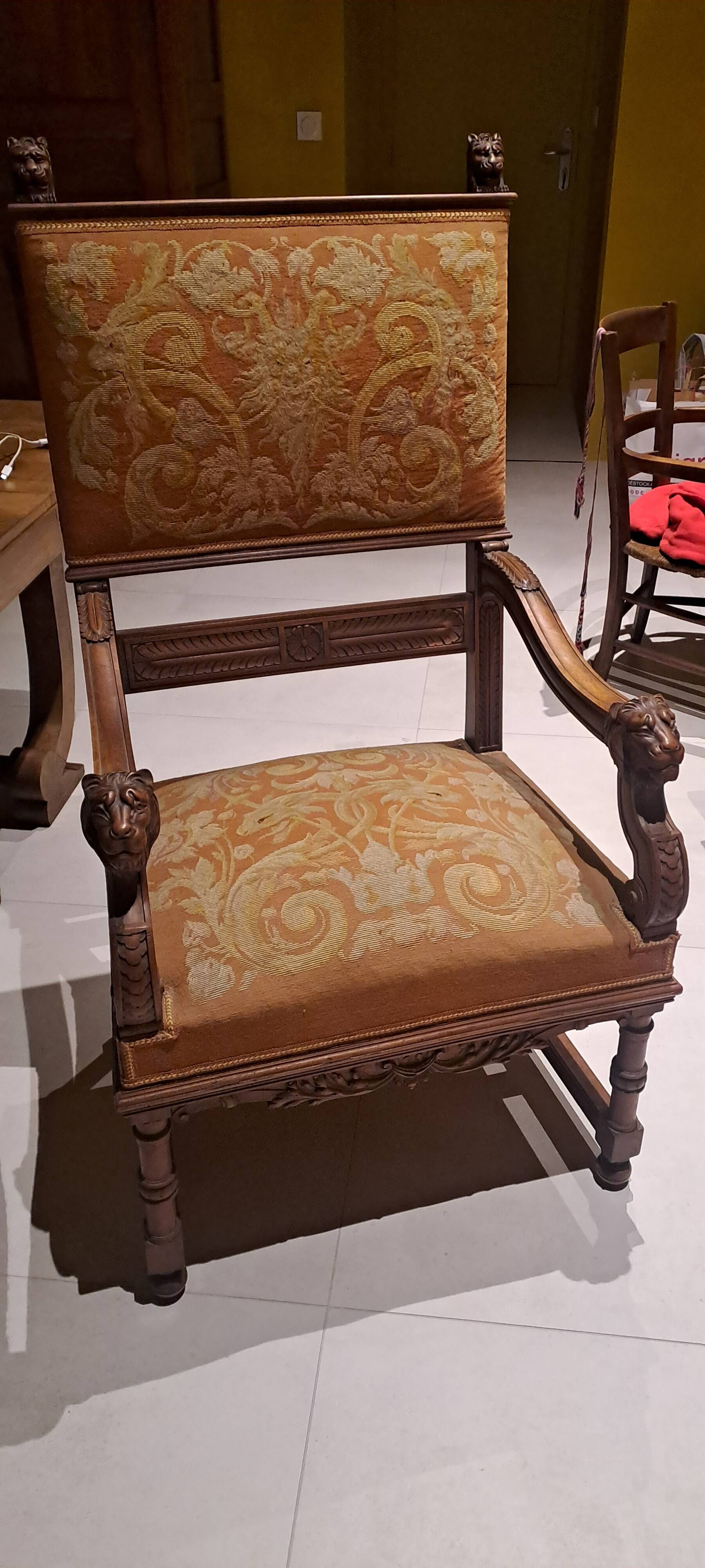 Antique lion head armchair