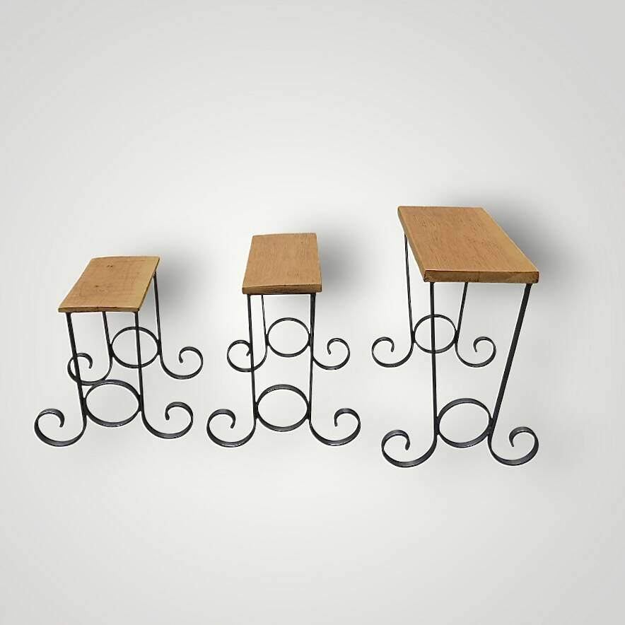 Antique wooden and wrought iron nesting tables – circa 1950
