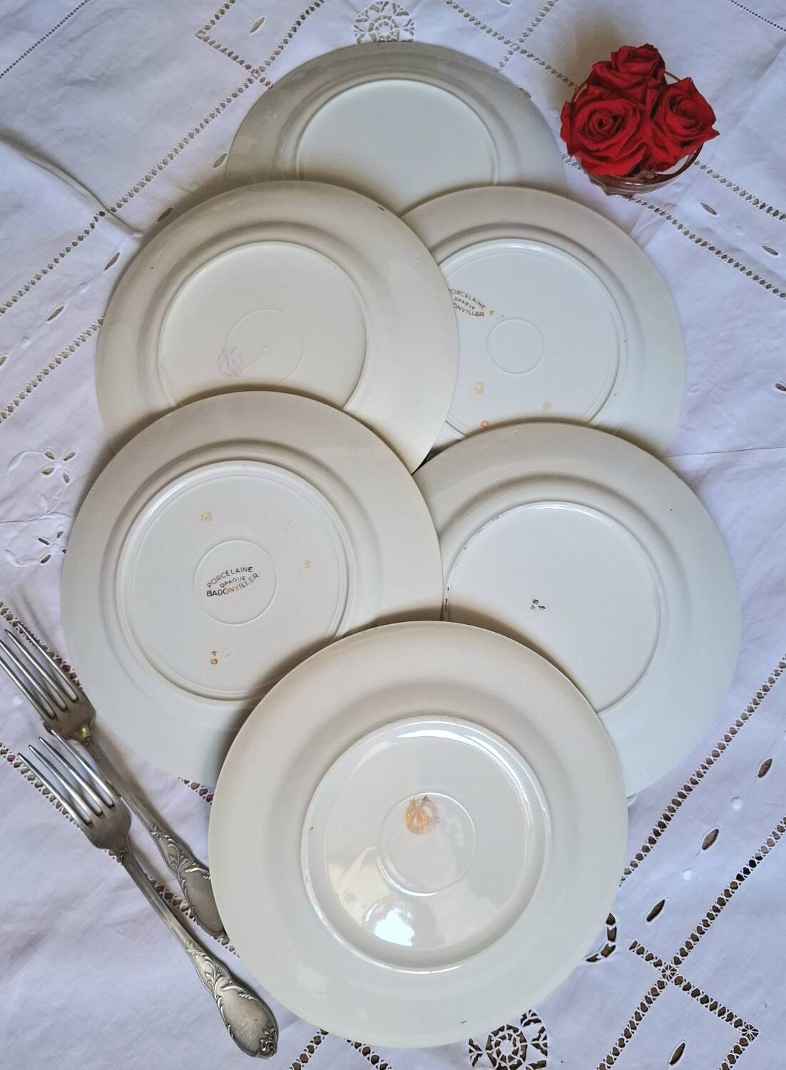 Old mismatched earthenware dinner plates