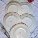 Old mismatched earthenware dinner plates