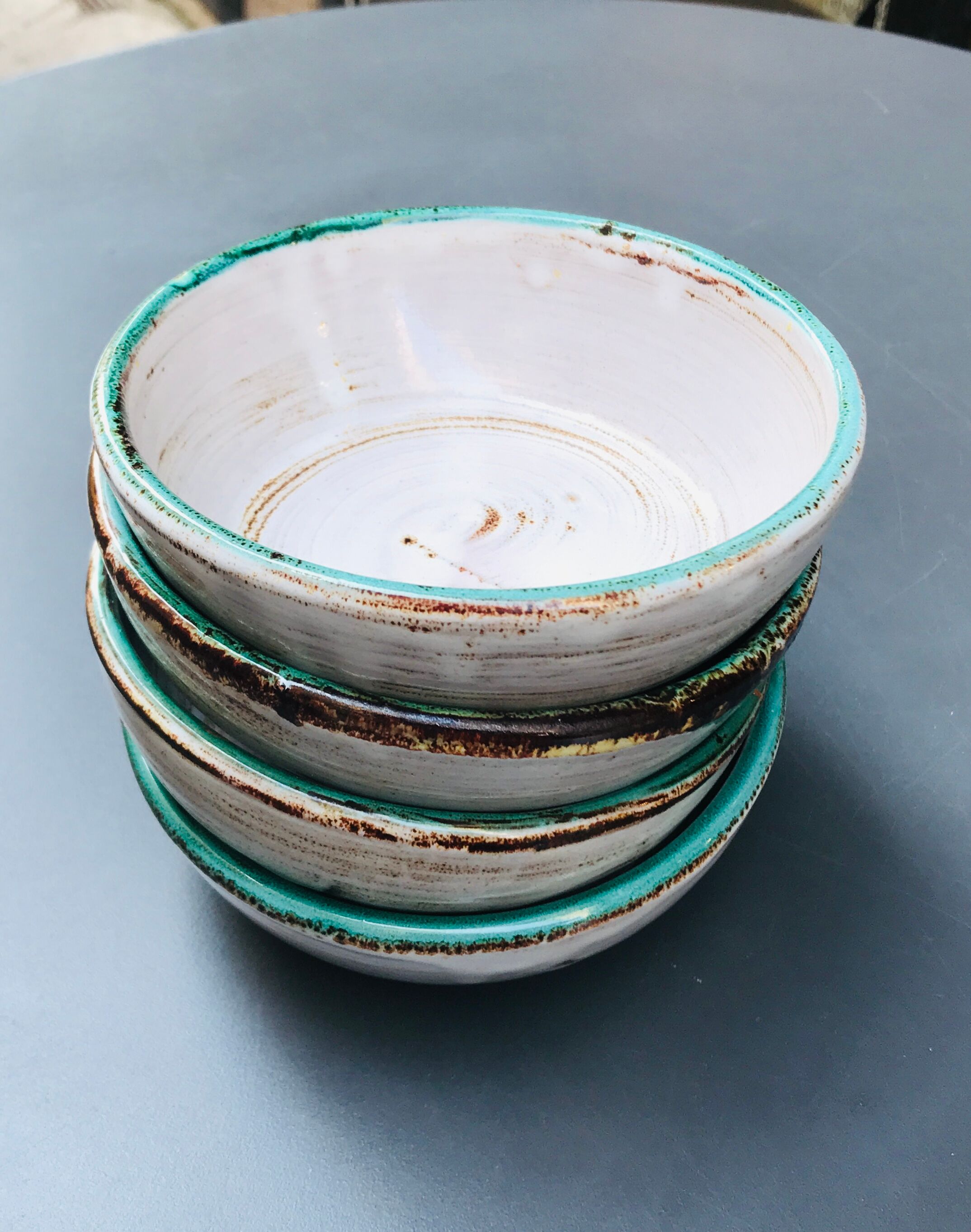 Set of 4 enamelled earth cups