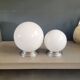 Pair of ceiling lights or wall lights with white glass globes.
