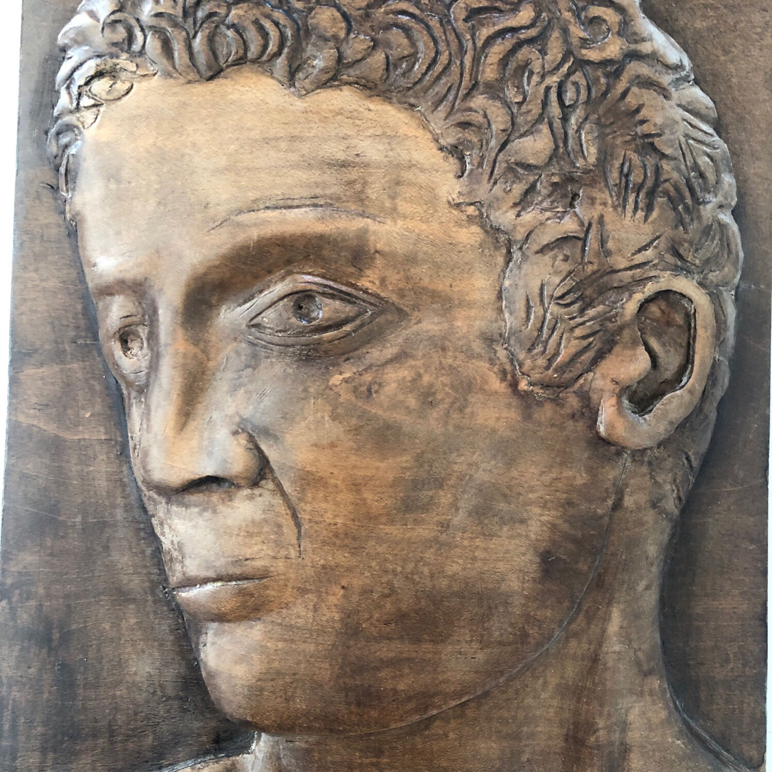 Wood carving profile man signed