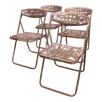 Series of four folding metal "llama" chairs, brutalist patina 1960