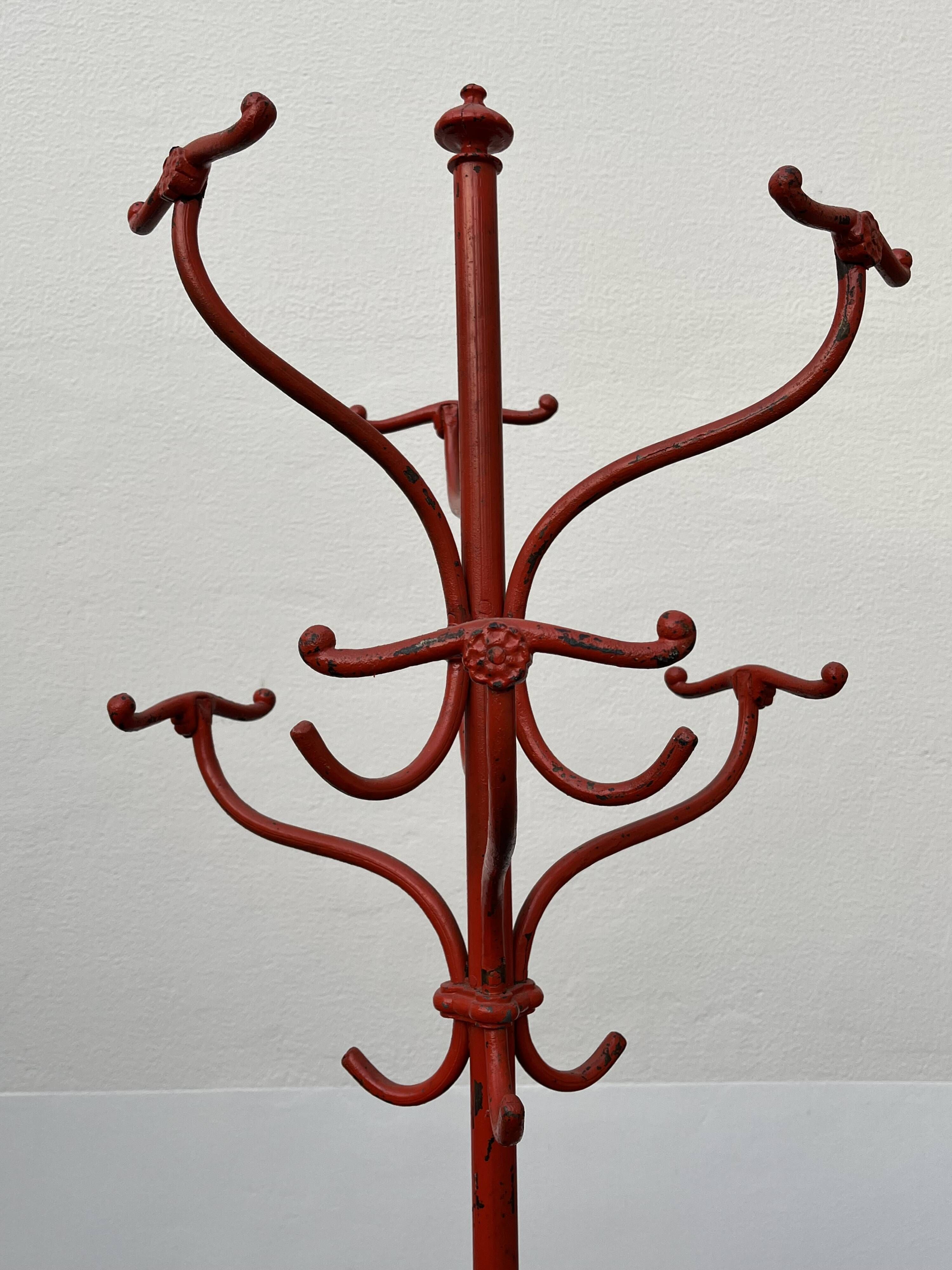 A freestanding coat rack by Hynek Gottwald