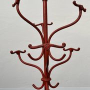 A freestanding coat rack by Hynek Gottwald