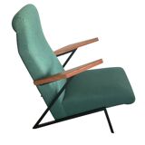 Lounge or easy chair with armrests