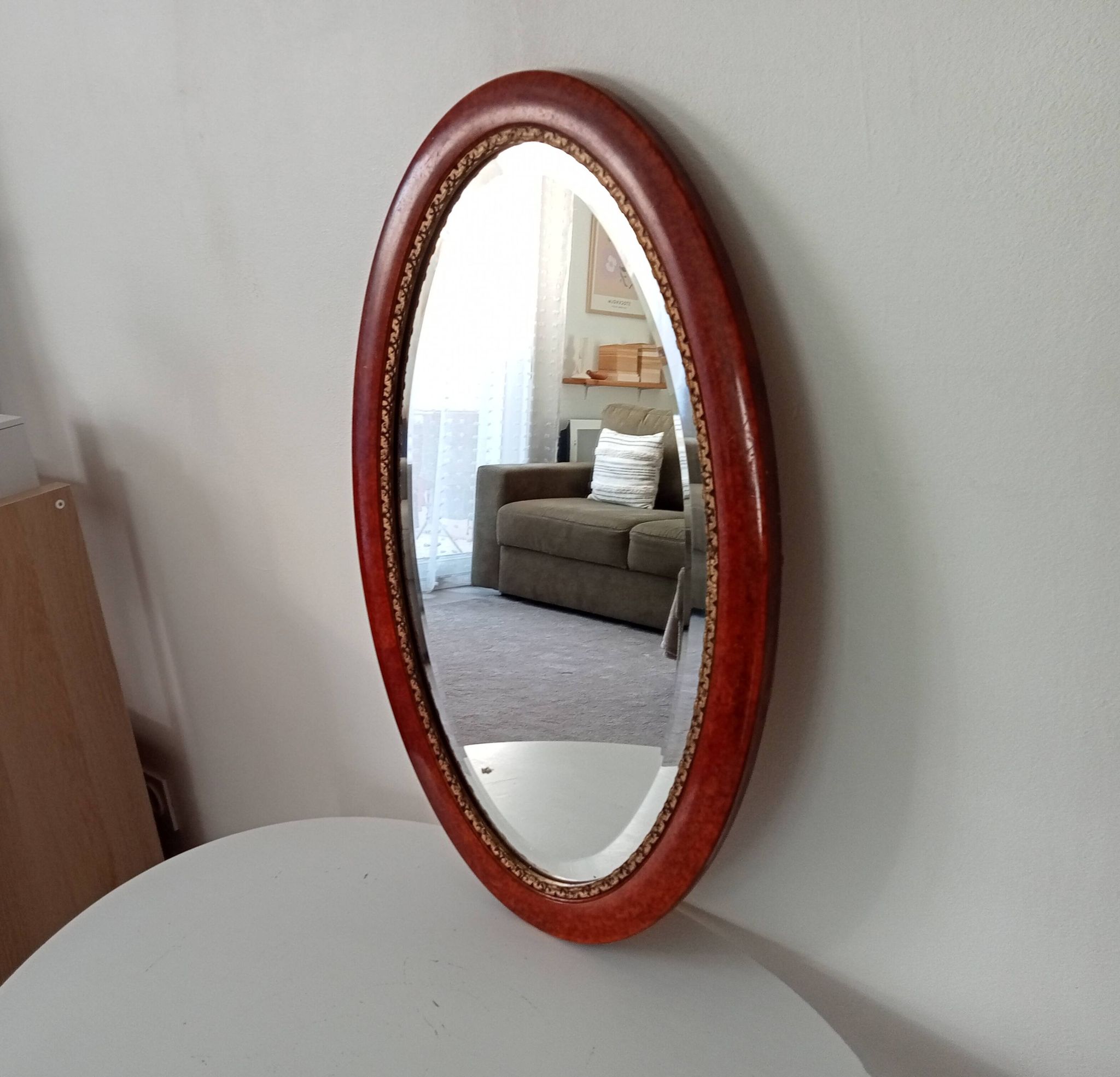 Antique oval mirror with bevelled glass