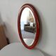 Antique oval mirror with bevelled glass
