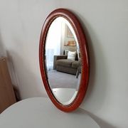 Antique oval mirror with bevelled glass